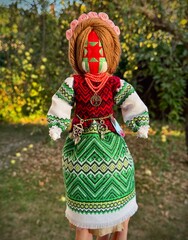 Beautiful elegant ,handmade dolls on background, magical Slavic wish doll