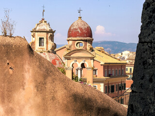 Corfu island old town. Greece. Church bell Tower on blue sky, Monastery of Panagia Tenedos.