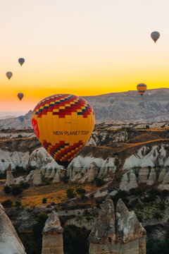 Colorful hot air balloon flying over Cappadocia, Turkey.
