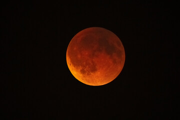 Astronomical photo of the Total Lunar Eclipse on September 7, 2025. The Full Corn Moon appears red during the eclipse, known as the Blood Moon.