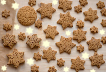 Homemade gluten free star shaped cookies with pistachio cream filling, sugar free biscuits on wooden table