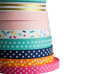 Colorful stack of decorative washi tapes with various patterns isolated on transparent background