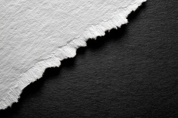 Torn paper, black and white