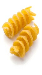 Two spirals of pasta, light golden yellow, against white background