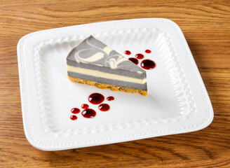 Cheesecake with a Graham Cracker Crust on a plate top view of Hong Kong food