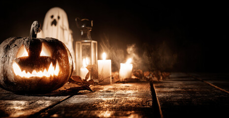 Obraz premium Scary halloween pumpkin on wooden planks 
