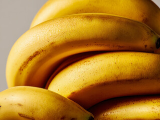 Ripe bunch of bananas showcasing vibrant yellow color and natural texture
