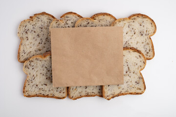 Bread slices and business card. Bakery branding mockup with empty space for your logo or design