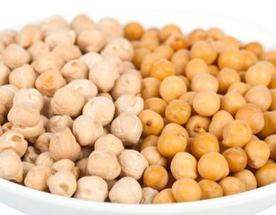 Two varieties of chickpeas in a white bowl