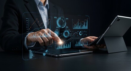 Business professional analyzing financial data on futuristic holographic interface with tablet