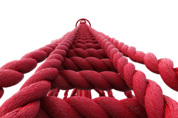 Low angle perspective of a red rope climbing net structure.
