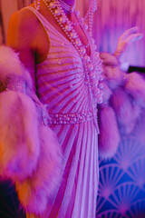 Elegant flapper dress adorned with pearls and feathers at a vintage-themed event in vibrant purple...