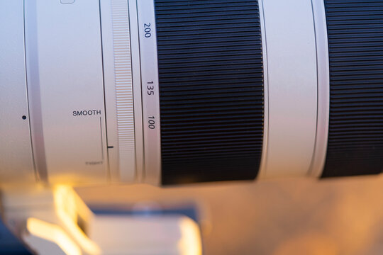 Fototapeta Large white telephoto lens close up macro