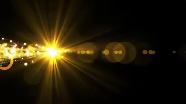 Abstract Golden Light Flare Effects And Bokeh On A Black Background Adobe Stock Photo