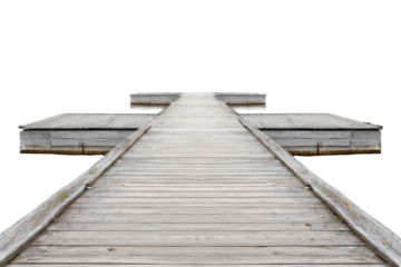 Long weathered wooden pier with a T-shaped end.