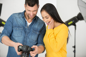 photographer posing with a model