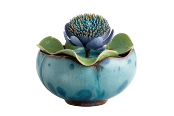 Artistic turquoise ceramic bowl with a stylized blue flower sculpture.