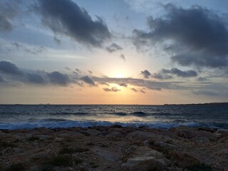 sunset on the beach in Paros, Greece