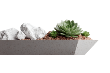 Modern geometric concrete planter with succulents and white rocks.