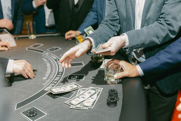 Exciting moments at a casino poker table with players gambling and enjoying the thrilling atmosphere