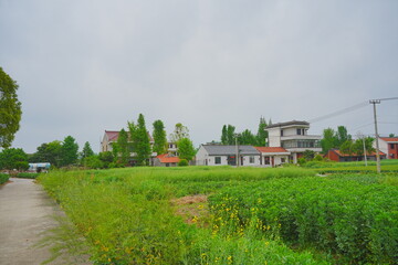 Obraz premium Nantong, Jiangsu, China: 04 21 2025: Beautiful Jiangsu Nantong traditional Chinese building, Roof, wall, tile and door
