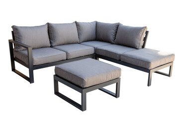 Fototapeta premium Modern grey outdoor patio furniture set with sectional sofa and ottoman.