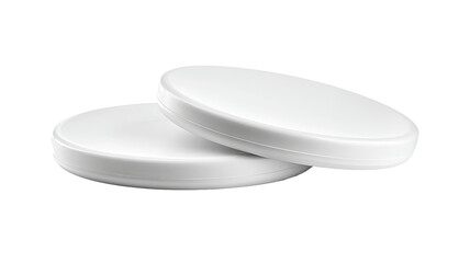 Two round, white lids stacked