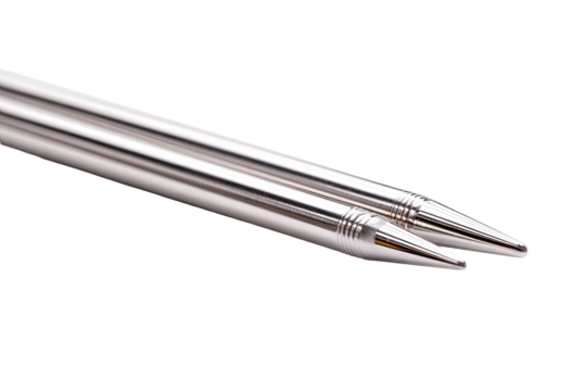 Two parallel, silver-toned metal rods, close-up.  The rods taper to pointed tips.  A slightly textured area is visible near the pointed ends