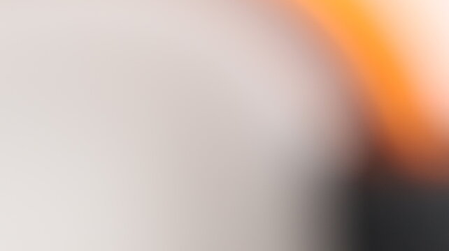 Blurry abstract with warm orange and light gray, soft focus background, elegant gradient.