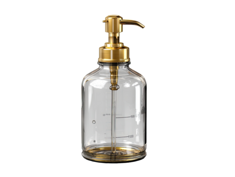Clear glass bottle with gold accents.  A simple, clear glass bottle with a gold-toned pump dispenser and graduated markings