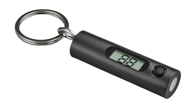 A small, black, cylindrical keychain-mounted digital gauge.  Features a digital display showing a numerical value, likely a measurement, and a metal keyring