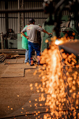 worker welding steel