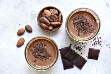 Chocolate banana smoothie. Top view with copy space.