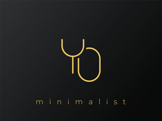 YO Minimalist Logo with Interlocking Shapes on Solid Black Background. A clean and modern minimalist logo design.