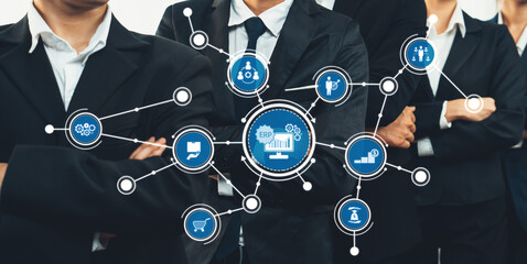 A group of professionals in business attire stands confidently, surrounded by digital icons symbolizing various business concepts, showcasing innovation in corporate collaboration. Amity
