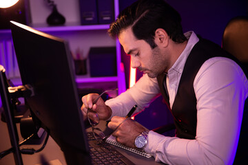 Smart businessman writing memo market data on paper work report folder to analyze sales channel...