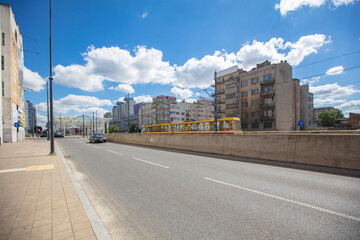 Yellow Tram on a City Street in Łódź.