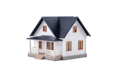 Miniature white house with dark gray roof and porch