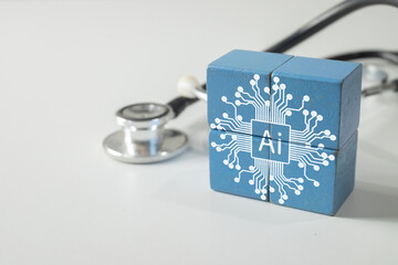 An AI icon on blue blocks with a stethoscope. A concept for Artificial Intelligence in healthcare,...