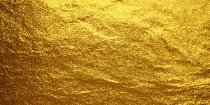 This luxurious golden texture creates a rich and elegant background with detailed highlights.