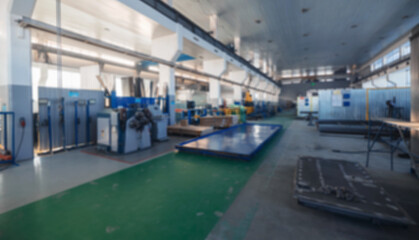 Fototapeta premium Modern industrial factory interior with heavy machinery and equipment