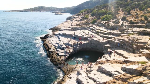 Giola lagoon in Thassos Island, Greece.  One of the most place in Thassos. Amazing sea with clear blue water. Aerial panoramic drone view from above, top view from drone. Summer holidays Europe
