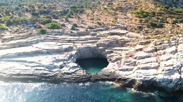 Giola lagoon in Thassos Island, Greece.  One of the most place in Thassos. Amazing sea with clear blue water. Aerial panoramic drone view from above, top view from drone. Summer holidays Europe
