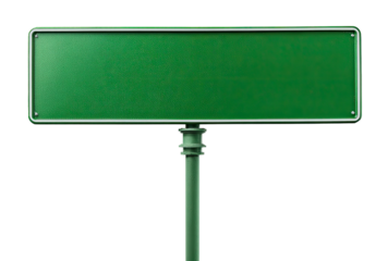 Empty green street sign on a dark background