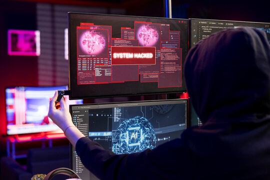 Hacker targets systems with virus infected USB, getting system hacked popup alert on display. Evil man uses USB stick to compromise networks, hiding online activity after stealing data - Powered by Adobe