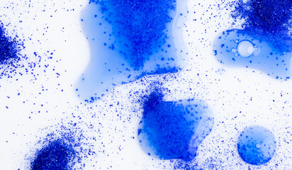Close up of Blue Copper Peptides in Powder and Liquid Form