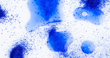 Close up of Blue Copper Peptides in Powder and Liquid Form