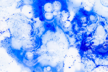 Close up of Blue Copper Peptides in Powder and Liquid Form