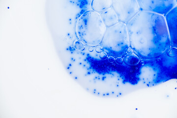 Close up of Blue Copper Peptides in Powder and Liquid Form