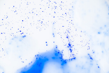 Close up of Blue Copper Peptides in Powder and Liquid Form